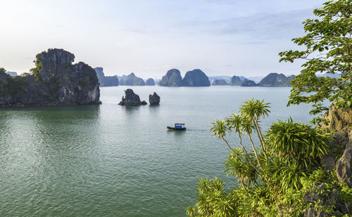 Scenic view of bay against sky