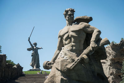 Low angle view of statue against sky