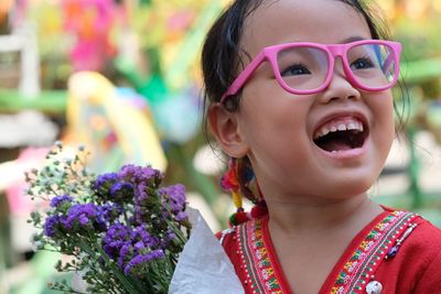 Close-up portrait of a smiling girl