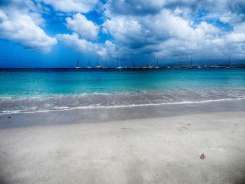 Scenic view of beach against sky