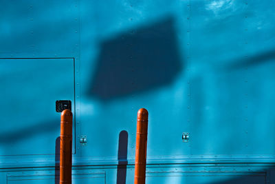 Sunlight falling on blue ship