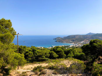 Scenic view of sea against clear blue sky