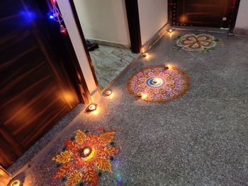 High angle view of illuminated lighting equipment on floor at home