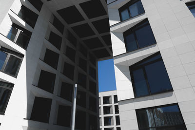 Low angle view of modern building against sky
