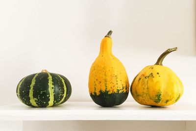 Close-up of oranges against white background