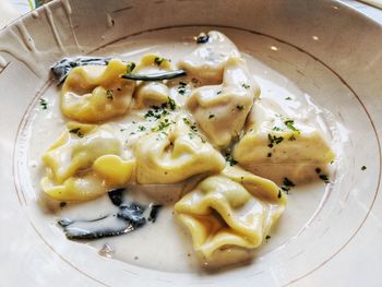 High angle view of pasta in plate on table