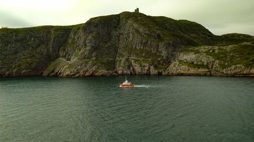 Boat sailing in sea