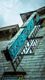 Low angle view of old building against sky