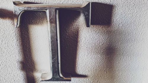 High angle view of metal grate on table