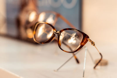 Close-up, designer glasses inside a shop window