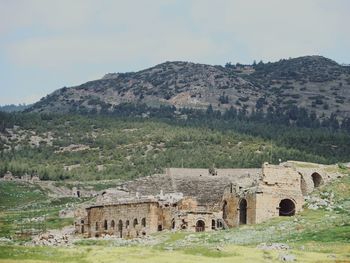 Ruins of building against sky