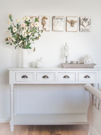 White vase against wall at home