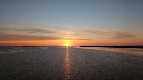 Scenic view of sea at sunset