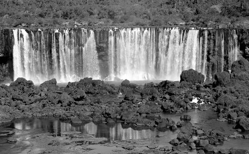 Panoramic view of iguazu falls at the brazilian side, foz do iguacu, brazil in monochrome
