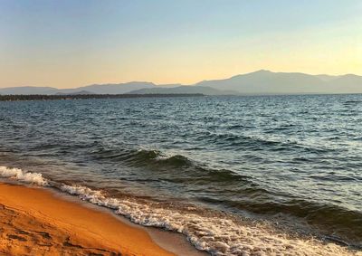 Scenic view of sea against sky during sunset