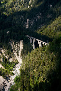 Railway bridge in the alps with viaduct