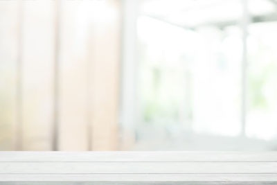 Close-up of window on wooden table