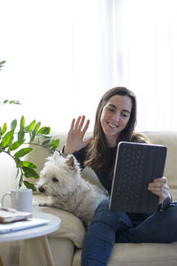 Portrait of woman with dog