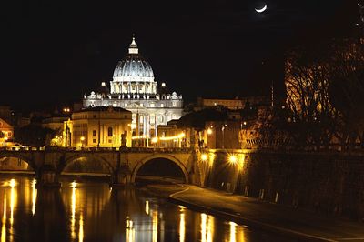 Bridge over river at night