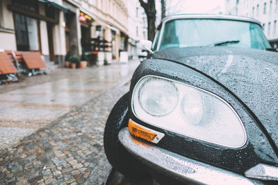 Close-up of car on street