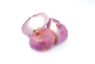 Close-up of garlic on white background