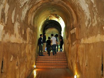 People walking in tunnel