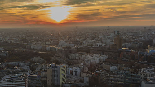 Aerial view of city at sunset