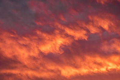 Low angle view of dramatic sky during sunset