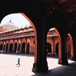 People at historical building