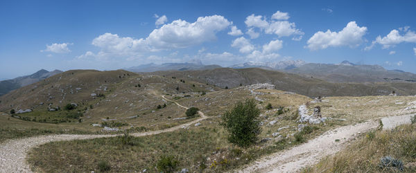 Extra wide angle panoramic view from rocca calascio on campo imperatore and the gran sasso massif