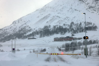 People skiing on snow covered mountain