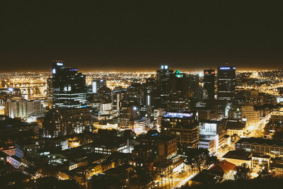 Illuminated cityscape at night