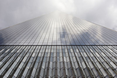 Low angle view of one world trade center against sky