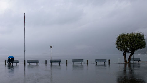 Scenic view of sea against sky during rainy season