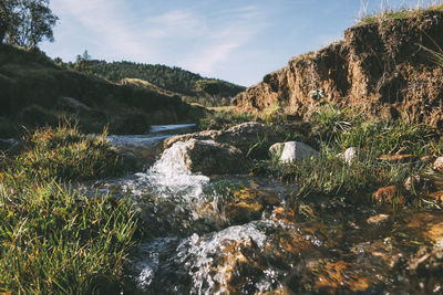 Scenic view of river against sky