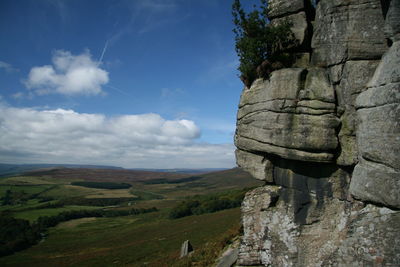 View of landscape against cloudy sky