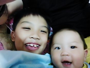 Close-up portrait of smiling boy