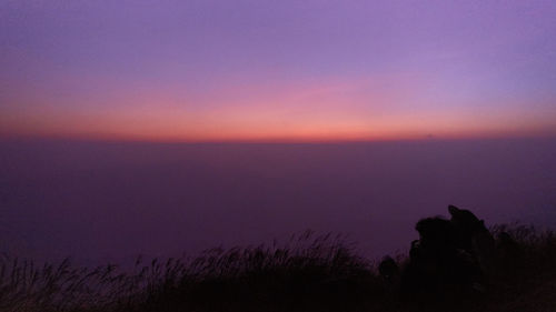 Scenic view of sea against sky at sunset