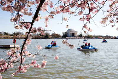 People in boats on tidal basin