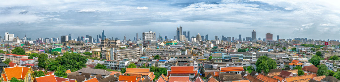 High angle view of buildings against sky in city