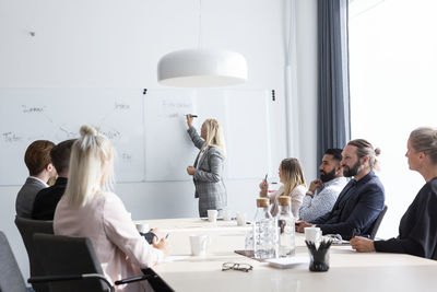 Woman having presentation at business meeting