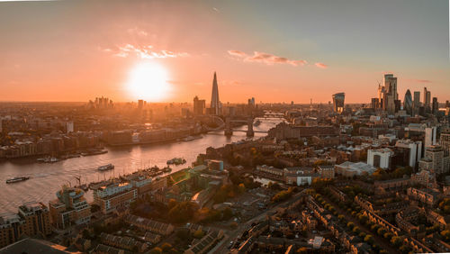 Aerial view of the london tower bridge at sunset.