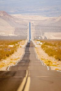 Road passing through rolling landscape