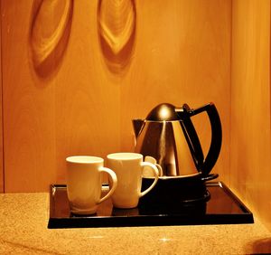 Coffee cup on table at home