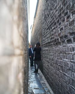 Full length of woman walking in city