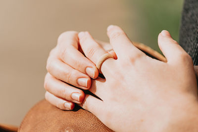 Close-up of woman hand holding ring