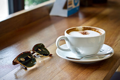 Coffee cup on table