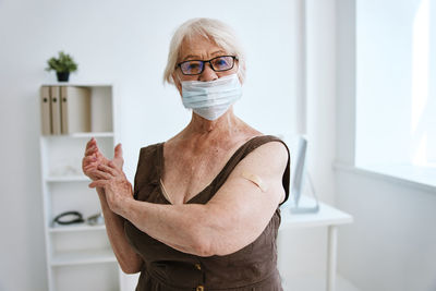 Portrait of woman wearing mask