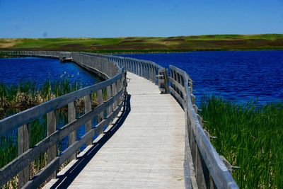 View of footbridge over sea