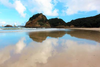 Panoramic view of beach and sea against sky